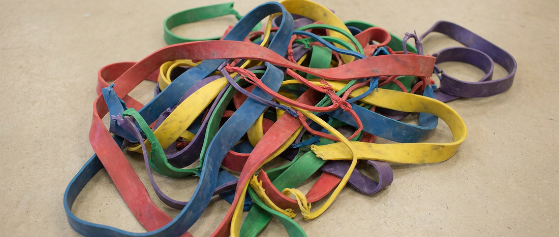 A tangled pile of cheap worn-out resistance bands