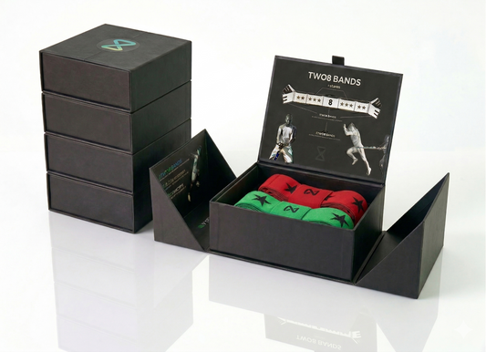 Two8 Move Better Bundle showing 5 sets of Two8 Bands in premium black boxes with Movement Band and Super Band visible