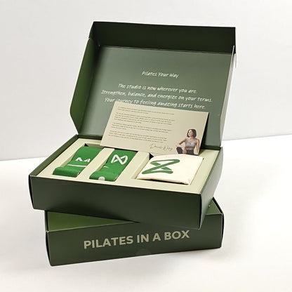 Pilates in a Box open gift box set with bands, bag and welcome card